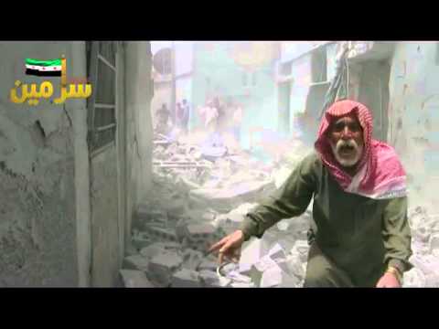 رجل يقول للأسد بجانب أنقاض بيته في سرمين : مابدنا ياك