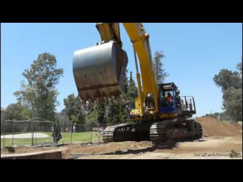komatsu - W.A. Rasic's KOMATSU PC1250LC-8 excavator in action working on L.A. river water supply pipe project.
