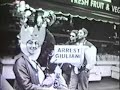 save the gardens / reclaim the streets protest in new york city, 1998.  the people protesting mayor rudy giuliani's bullying and stinginess as sung by paul robeson. 

many are also protesting in memory of worker hero songwriter joe hill.  sung by paul robeson.