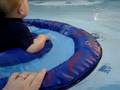 elliot swims in floatie