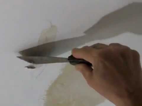 plaster repair - Demonstration how to repair water damage to a plaster ceiling. Check http://www.do-it-yourself-help.com/repair_wall_water_damage.html for more.