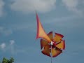 Click here to watch this video Peter's Windspiele Zweirädriges Farbspiel Gelb rot