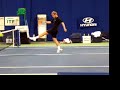 Tursunov kicking ball during practice session Hopman