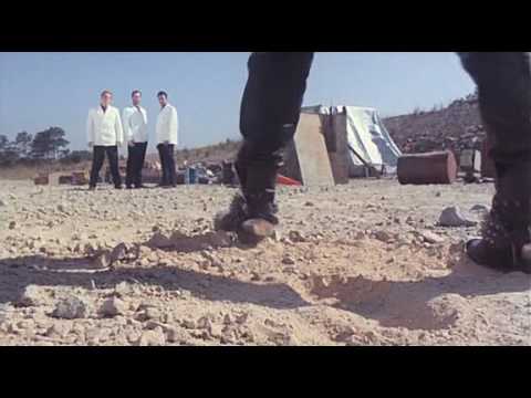 robotrix.1991 - This is the scene from the movie Robotrix where a guy gets decapitated by a wicker briefcase. http://www.90lostminutes.com/2010/03/robotrix.html.