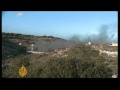 Migrants clash with police in Lampedusa