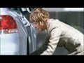 woman changing tire...