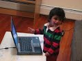 playing with laptop