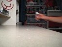 Tre flip on a fingerboard Tre flip on a fingerboard