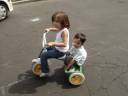Miranda G and Christian P on the tricylce