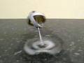 Gyroscope precessing on a block of ice - from gyroscope.com