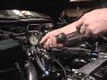 Engine coolant system and compression testing