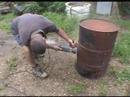barbecue - Two Men and a shed build a BBQ from an oil drum.