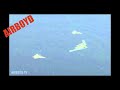 B-2 And F-22's In Flight