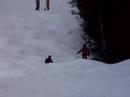 Anthony and Christopher ski the moguls at Ski Sundown