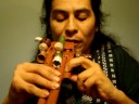 Native American Flute Player -Quadruple Glazed Clay Flute.