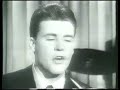 james burton use to be the houseband guitar player for the singers on shindig. the band was known as the shindogs.you can see him in the background on some of the shindig videos.delaney bramlett(delaney and bonnie) was also a member.