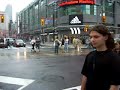 The new crosswalk at Yonge and Dundas Square. There are now secondary pedestrian signs. As you can see people are allowed to cut through the middle of the intersection, as the light then turns, and