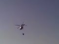Mancha Real-Helicoptero llenando agua piscina