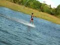 Surfing in artificial lake Kathu, Phuket, Thailand