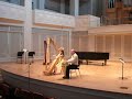 Layla Moore plays Milonga on the harp, accompanied by her father, Tim Moore, on conga. May 5, 2012.