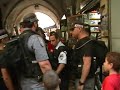 Israeli Soldiers attacking a Palestinian Mother and Son Israeli Soldiers attacking a Palestinian Mother and Son