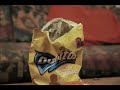 A man arrives home with a delicious bag of Doritos, plonking them on the table he leaves to tend to something else. Whilst away a tribe of Doritos escape from the packet to perform a quick sacrifice to the God of Salsa. the man returns interupting the ceremony, opening the pot of salsa he is confused to find a dorito already inside. Deciding his love for doritos outwieghs his suspicion the man devours the doritos. The Salsa God is appeased.
