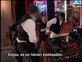 Two men fighting police