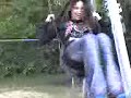 jen swinging on a swing fun box