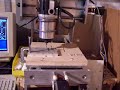 Here is a new video of our great little table top machine cutting aluminum once again with a larger 2HP Craftsman Spindle. We are cutting with a 1/4" carbide cutter at 12,000 rpm and going .025" deep 