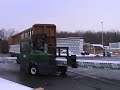 Combilift Unloading a Railcar