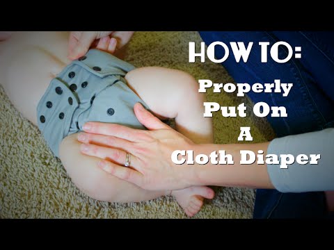how to properly put on a diaper