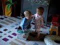 Triplets fighting over a box! Triplets fighting over a box!