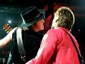 jon bon jovi and richie sambora came out into the crowd and sang a couple songs from a tiny little stage literally 2 feet away from where we were sitting.  we could reach out and touch them.