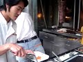 An Arabic dude makes me a phat shawarma on the streets of Guangzhou.