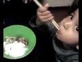 Georgie \"baba\" using chopstix