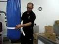 videos de Nunchaku practise by store keeper of PUTRA MA sports shop.