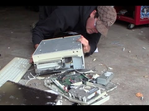 apple computers - Best way to take out stress, Beating up outdated technology. three classic Apple machines bite the dust as well as software bundles and keyboards.