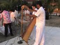 MUSICOS DE ZIHUATANEJO Y BODAS EN LA PLAYA CON MUSICA CLASICA TIPO CELTA CON ARPA Y PIANO