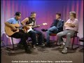 carlos guitarlos plays live on art fein's poker party, 10-15-96. todd everett looks on.