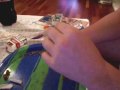Rolling a big joint.