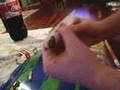 TV Videos - Rolling a big joint.