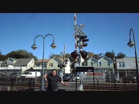 railroad crossing - This is a video I made while on vacation in the Northeast in New Jersey at the NJ Transit rail station in Elberon New Jersey of a pedestrian railroad crossin...