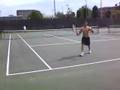 Dracoy Playing Tennis