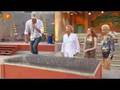 Enrique Iglesias laying on the bed of nails