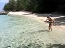 Feeding fish Poda island Thailand
