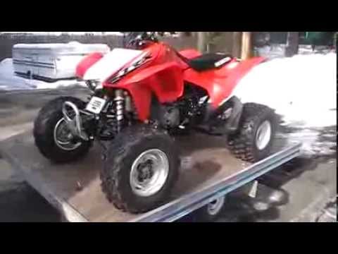 how to drain old gas from snowmobile