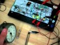 Proto de compteur Geiger-Muller testé avec la radioactivité de la peinture fluo d'un vieux réveil