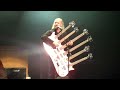 Bill Bailey playing his 6 neck guitar