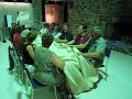 angus mcleod, a teacher at the gaelic college, leads a group of clan ross members as we sing in a 