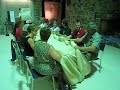 angus mcleod, a teacher at the gaelic college, leads a group of clan ross members as we sing in a 